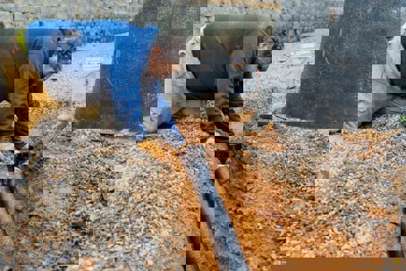 traditional sewer line replacement outdoors in progress