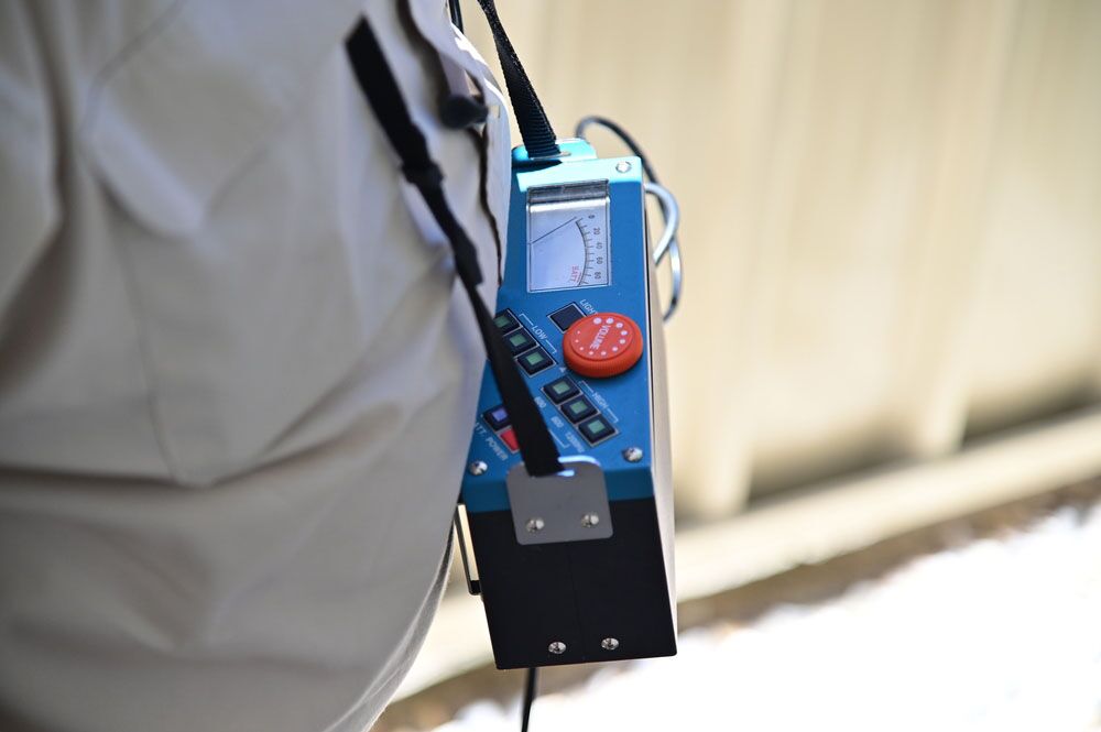 Top Rank technician using leak detection equipment Top Rank technician using leak detection equipment