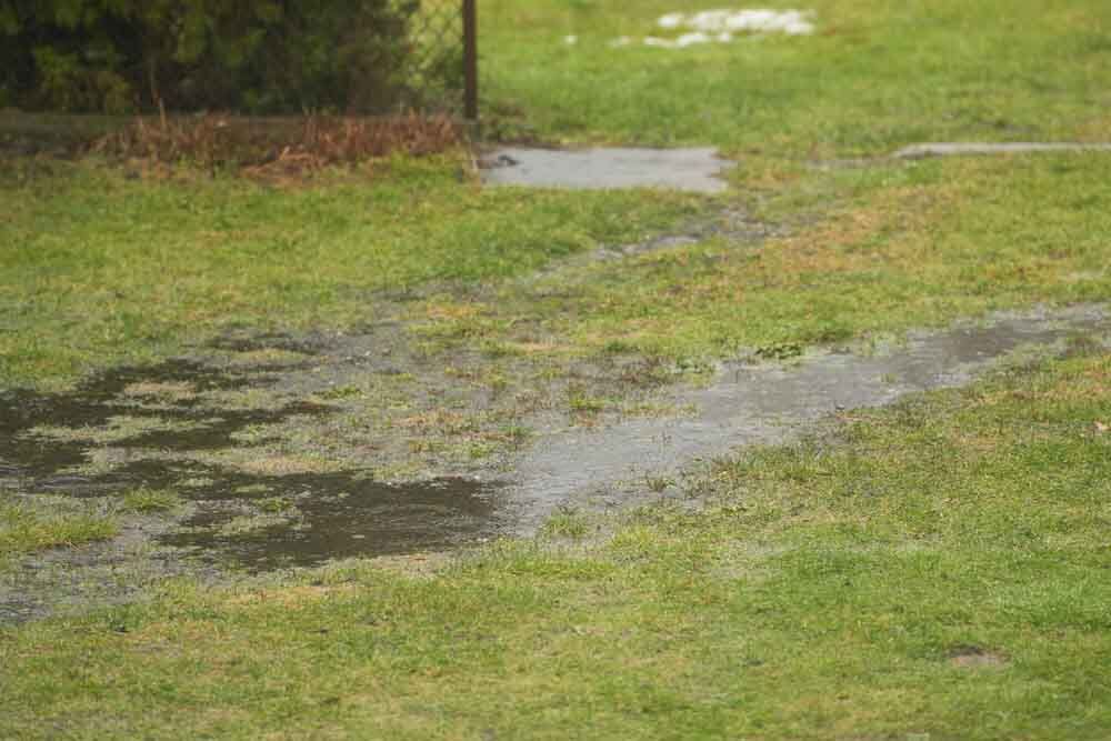 flooded or muddy lawn or garden flooded or muddy lawn or garden