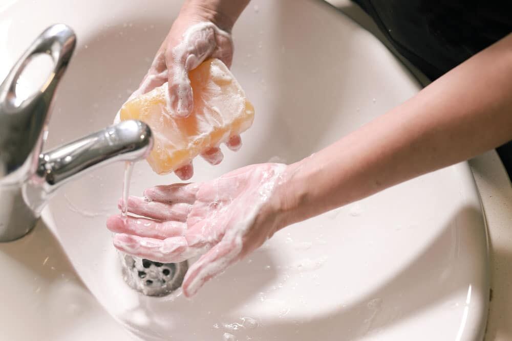 closeup of washing hands with soap closeup of washing hands with soap
