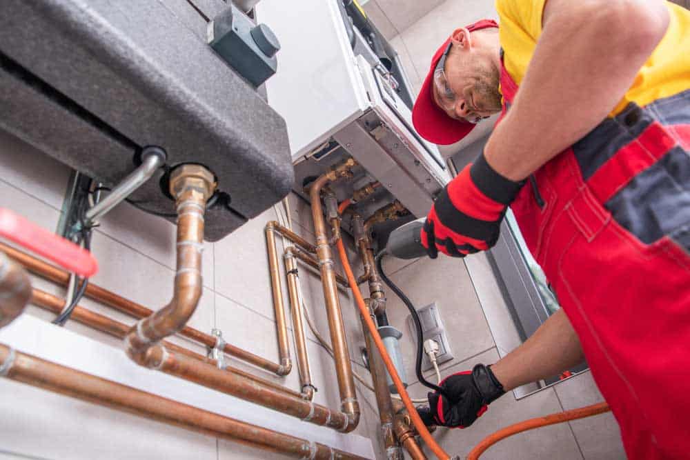 plumber detecting a leak