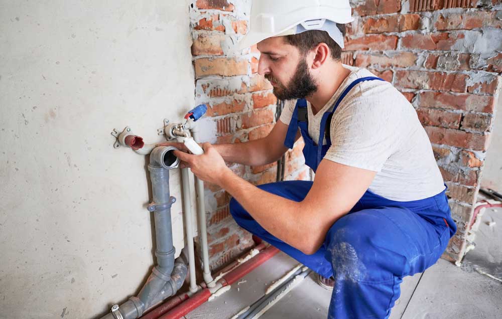 Top Rank technician working on residential sewer repairs